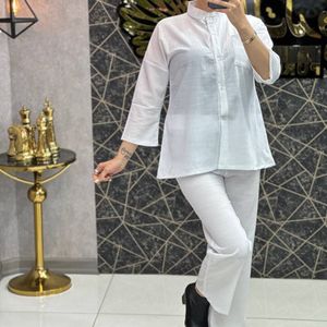 خرید آنلاین ست مانتو شلوار زنانه اسکاچی ابروبادی فری سایز (ارسال رایگان)