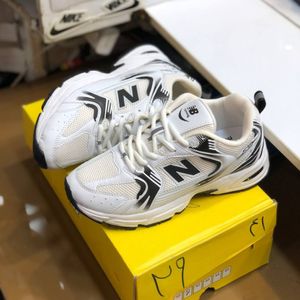 خرید آنلاین کفش نیوبالانس 530 زنانه رنگ سفید مشکی