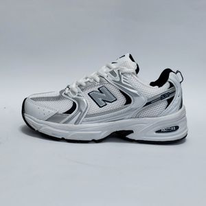 کتونی نیوبالانس 530 طوسی سرمه ای با کیفیت