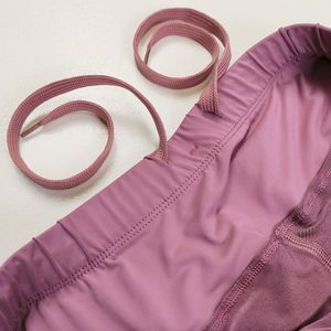 مشخصات دامن ورزشی کشاله دار پشت جیب دار