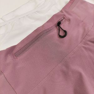 مشخصات دامن ورزشی کشاله دار پشت جیب دار