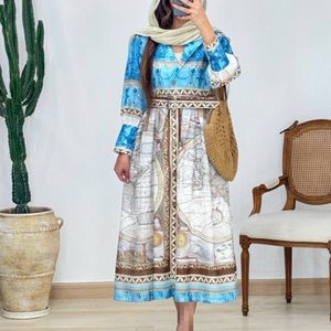خرید اینترنتی مانتو بلند مزونی کمربنددار رنگی