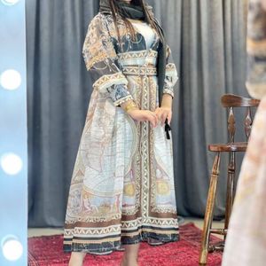 خرید آنلاین مانتو بلند مزونی کمربنددار رنگی