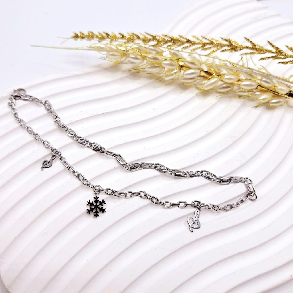 فروش اینترنتی دستبند دولاین طرح دونف برف و موزیک استیل