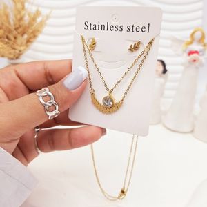 خرید آنلاین ست گوشواره و گردنبند دو لاین برگ و آویز نگین دار رنگ طلایی استیل