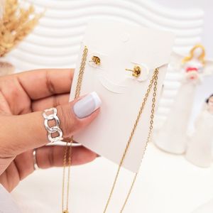 قیمت ست گوشواره و گردنبند دو لاین برگ و آویز نگین دار رنگ طلایی استیل
