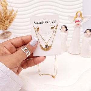 خرید اینترنتی ست گوشواره و گردنبند دو لاین برگ و آویز نگین دار رنگ طلایی استیل