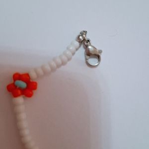 خرید آنلاین دستبند یا پابند منجوق طرح گل