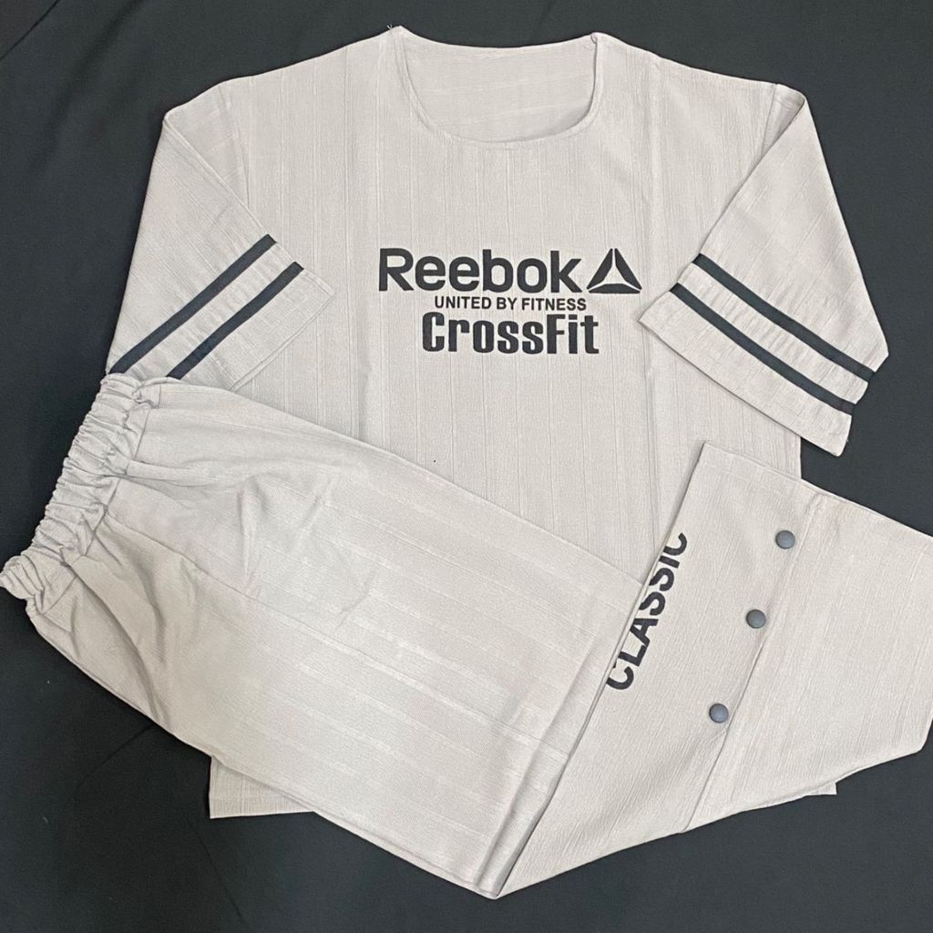 فروش اینترنتی ست تیشرت و شلوار زنانه فری‌سایز چاپ ریبوک