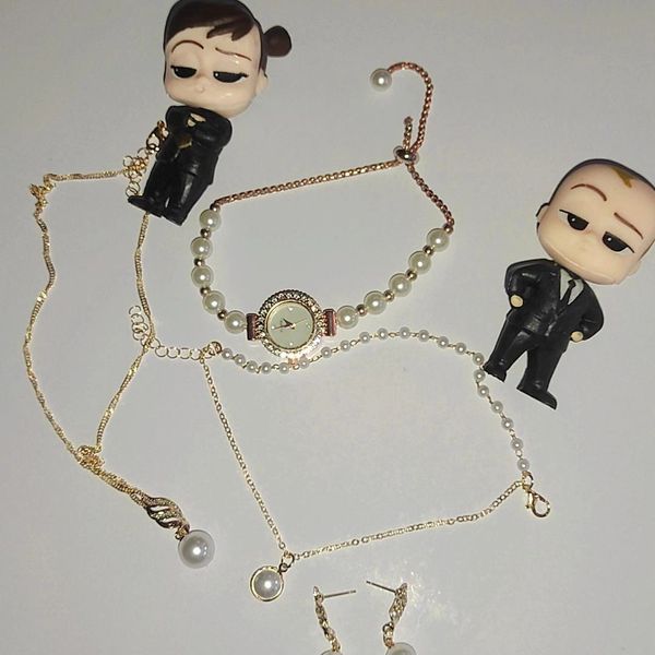 ساعت مچی زنانه مرواریدی صفحه صدفی جنوا