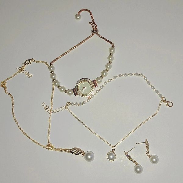 ساعت مچی زنانه مرواریدی صفحه صدفی جنوا