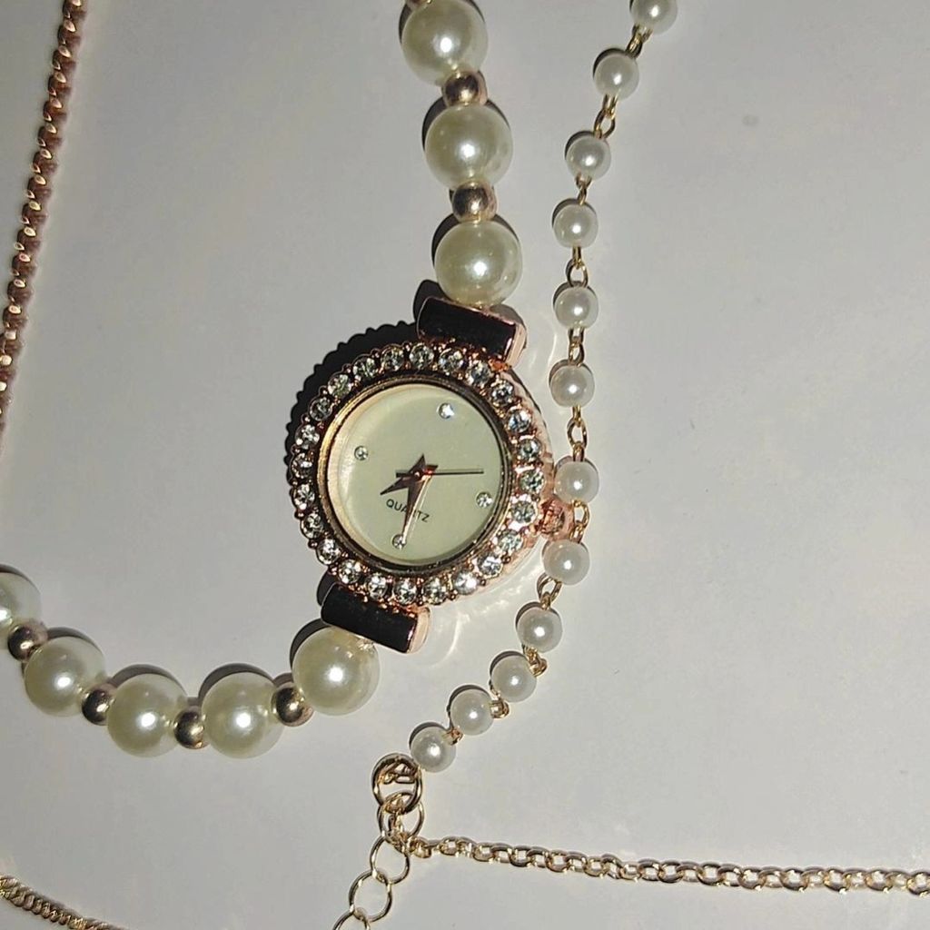 مشخصات ساعت مچی زنانه مرواریدی صفحه صدفی جنوا