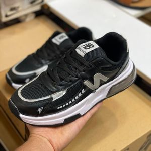 خرید انلاین کفش نیوبالانس طرح زیره کپسولی مردانه مشکی