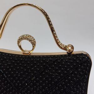 مشخصات کیف زنانه مجلسی نگین دار مشکی