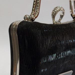 فروش اینترنتی کیف زنانه مجلسی چرم دسته نگین دار