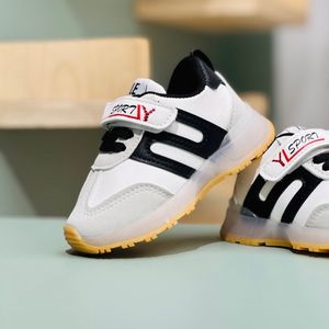 خرید اینترنتی قیمت کتونی بچگانه چراغدار طرح S برند Kids کد 4022705