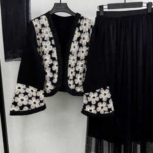 مشخصات سه تیکه کت و دامن و شال