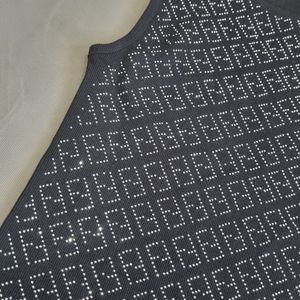 فروش اینترنتی تاپ مجلسی زنانه مشکی نگین دار فری سایز تا 40 با طراحی خاص و شیک