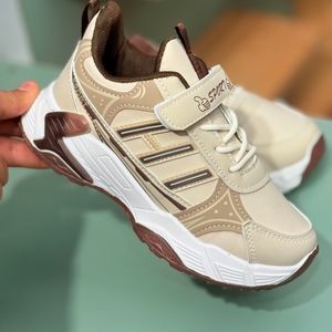 خرید اینترنتی قیمت کتونی بچگانه طرح سه خط برند K-Z کد 4061203