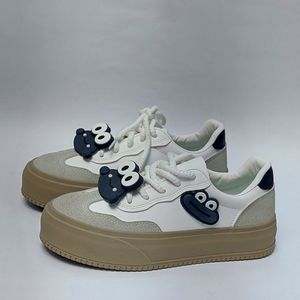 خرید انلاین کتونی ونس قورباغه دخترانه کرم سرمه ای