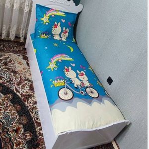 خرید انلاین روتختی یک نفره زمینه ابی اسمانی روتختی کارتونی طرح دوچرخه