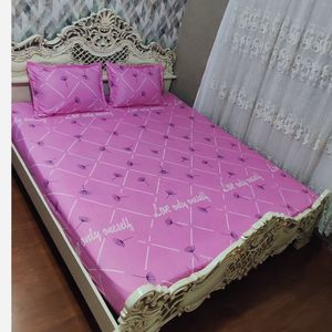 فروش اینترنتی ملحفه دورتادورکشدوزی شده تخت دونفره قاصدک  زمینه صورتی