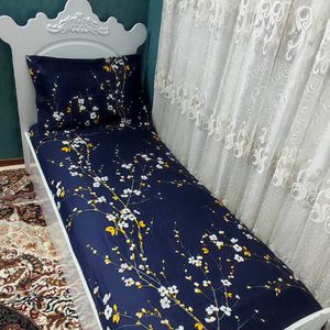 ملحفه دورتادور کشدوزی شده تشک تخت تک نفره طرح شکوفه سورمه ای
