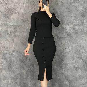 مشخصات بلوز دامن آستین دکمه