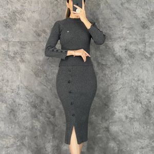 قیمت بلوز دامن آستین دکمه