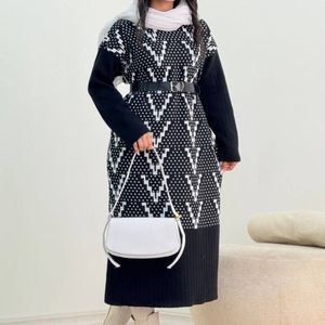 خرید آنلاین مانتو بافت طرح وی کد 5000