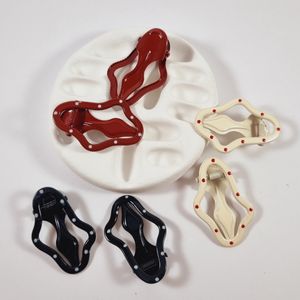 گیره فلزی زنانه دفرمه خالدار