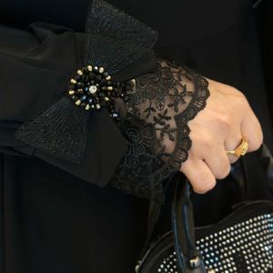 مشخصات مانتو عبایی آستین پاپیون