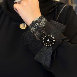 خرید انلاین مانتو عبایی آستین پاپیون