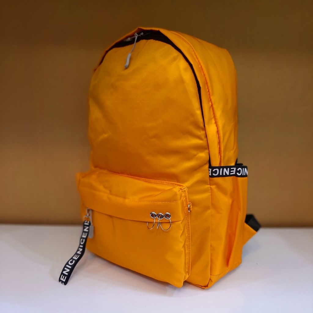 خرید اینترنتی کوله پشتی ساده رنگ زرد