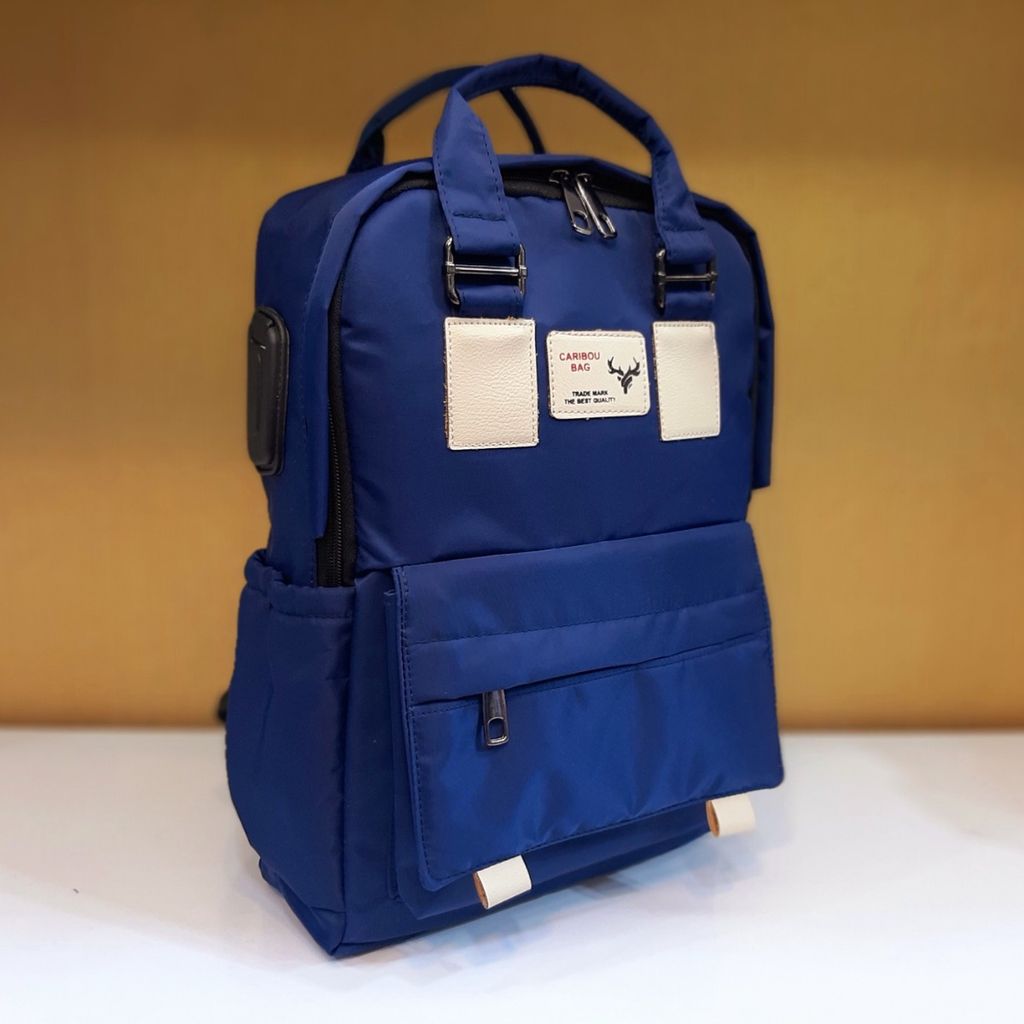 خرید انلاین کوله پشتی Caribou دسته‌دار سورمه‌ای