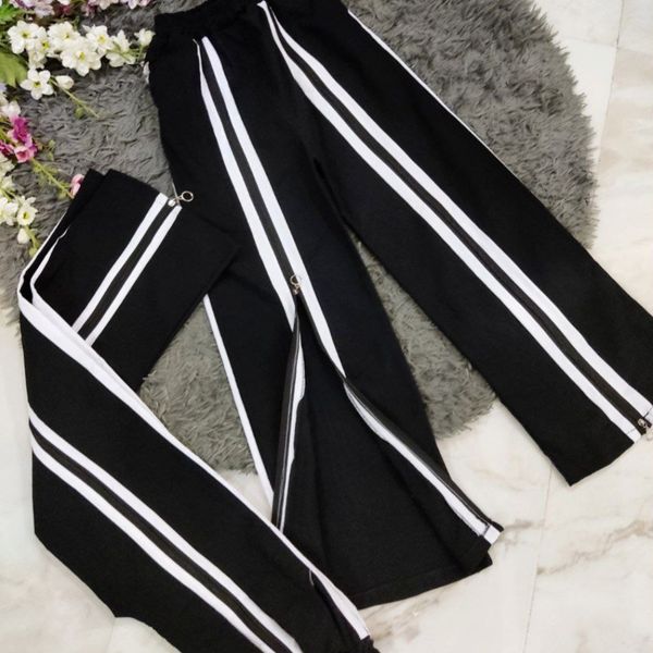 شلوار زنانه طرح ساتین جلو زیپ نوار دار