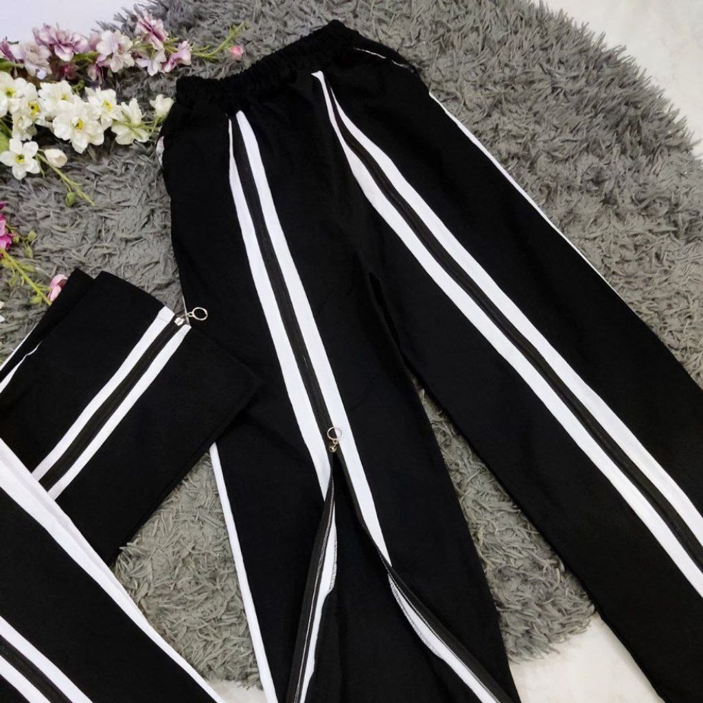 فروش اینترنتی شلوار زنانه طرح ساتین جلو زیپ نوار دار