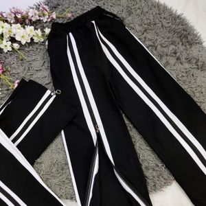 فروش اینترنتی شلوار زنانه طرح ساتین جلو زیپ نوار دار