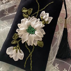 کیف عینک مدل آفتابگردون