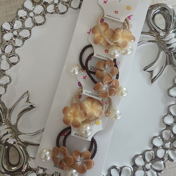 کش مو گل مرواریدی