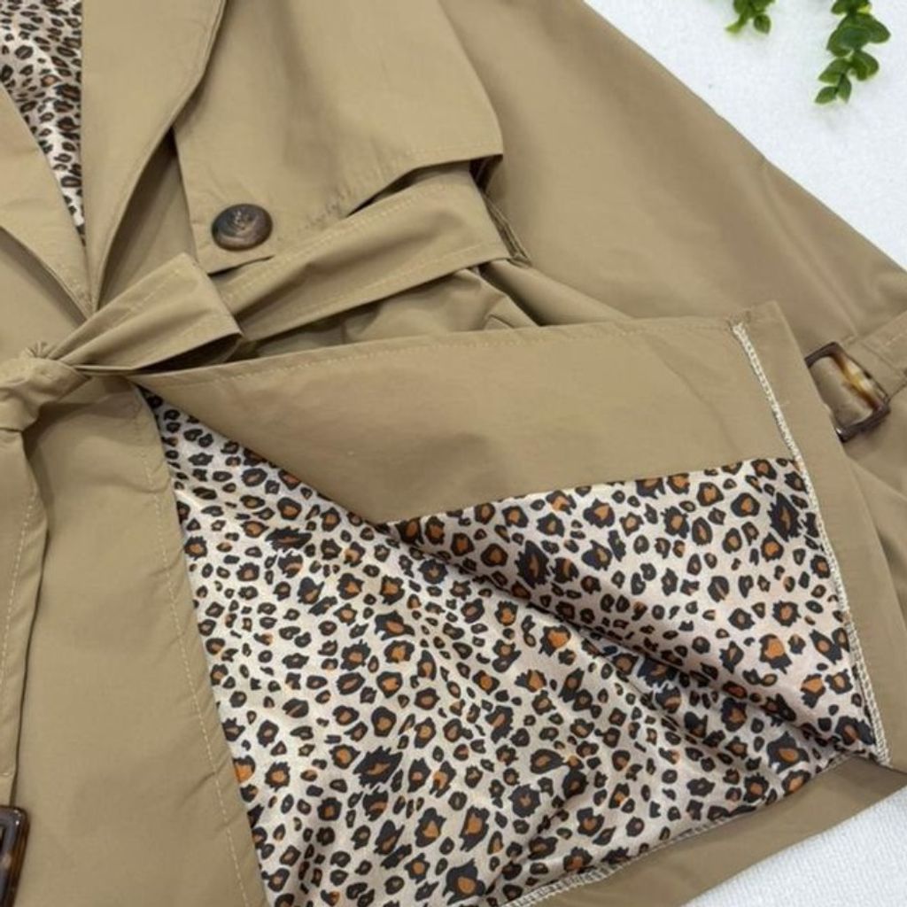 خرید اینترنتی مانتو بارونی آستردار مانیا