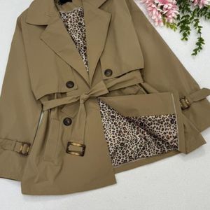 فروش اینترنتی مانتو بارونی آستردار مانیا