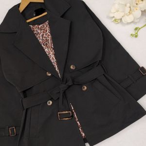 فروش اینترنتی مانتو بارونی آستردار مانیا