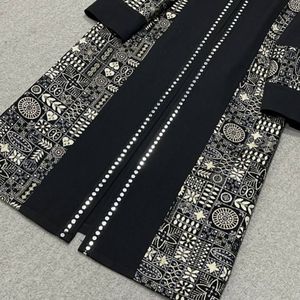 خرید اینترنتی مانتو مزونی اطلس