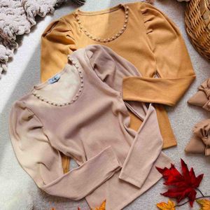 مشخصات بلوز کبریتی آستین پفی یقه مرواریدی زنانه