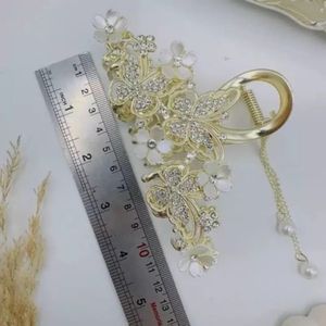 خرید اینترنتی کلیپس مجلسی پروانه شکوفه سفید