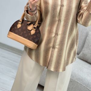 خرید اینترنتی شومیز پشمی نادی