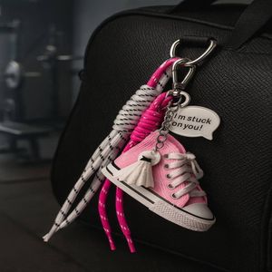 اویز کیف و کلید زنانه مدل کتونی ال استار از جنس چرم