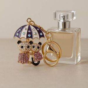 جا کلیدی و اویز کیف زنانه نگین دار مدل تدی از جنس فلزی