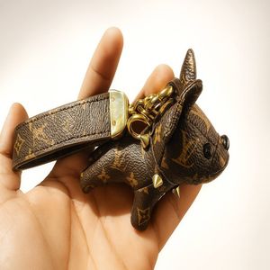 مشخصات جا کلیدی و اویز کیف سگ مدل لویی ویتون از جنس چرم